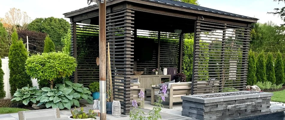 Dark wood cabana in Cary, NC, with slat walls.