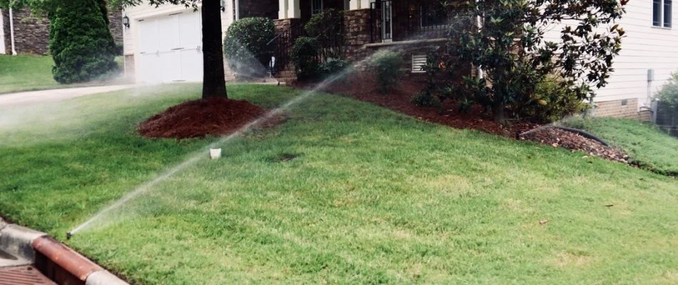 Lawn in Fearrington, NC, with a sprinkler irrigation system.